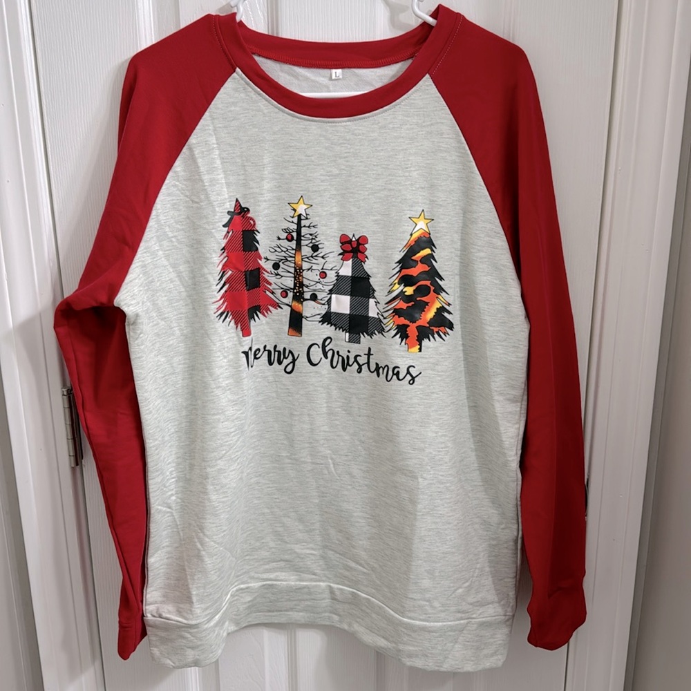 Brand new women’s holiday sweatshirt size large.
